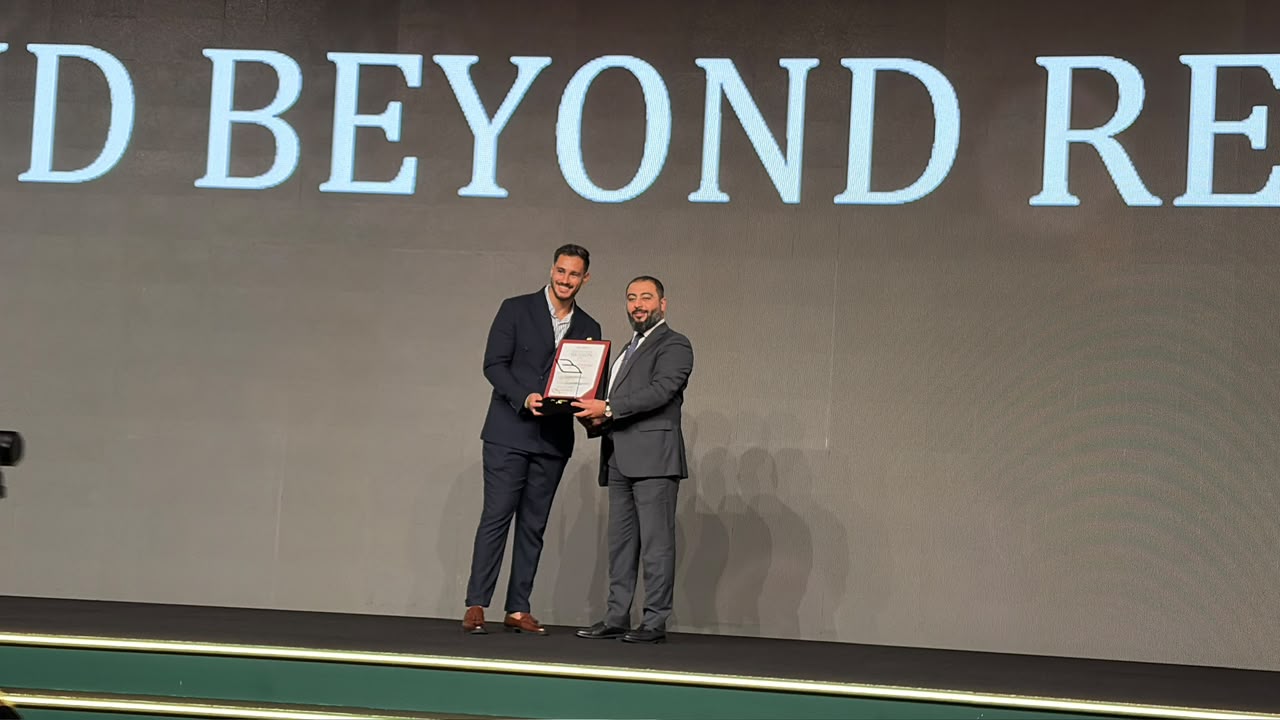 Spaces & Beyond founders receiving the Broker Recognition Award 2026 on stage